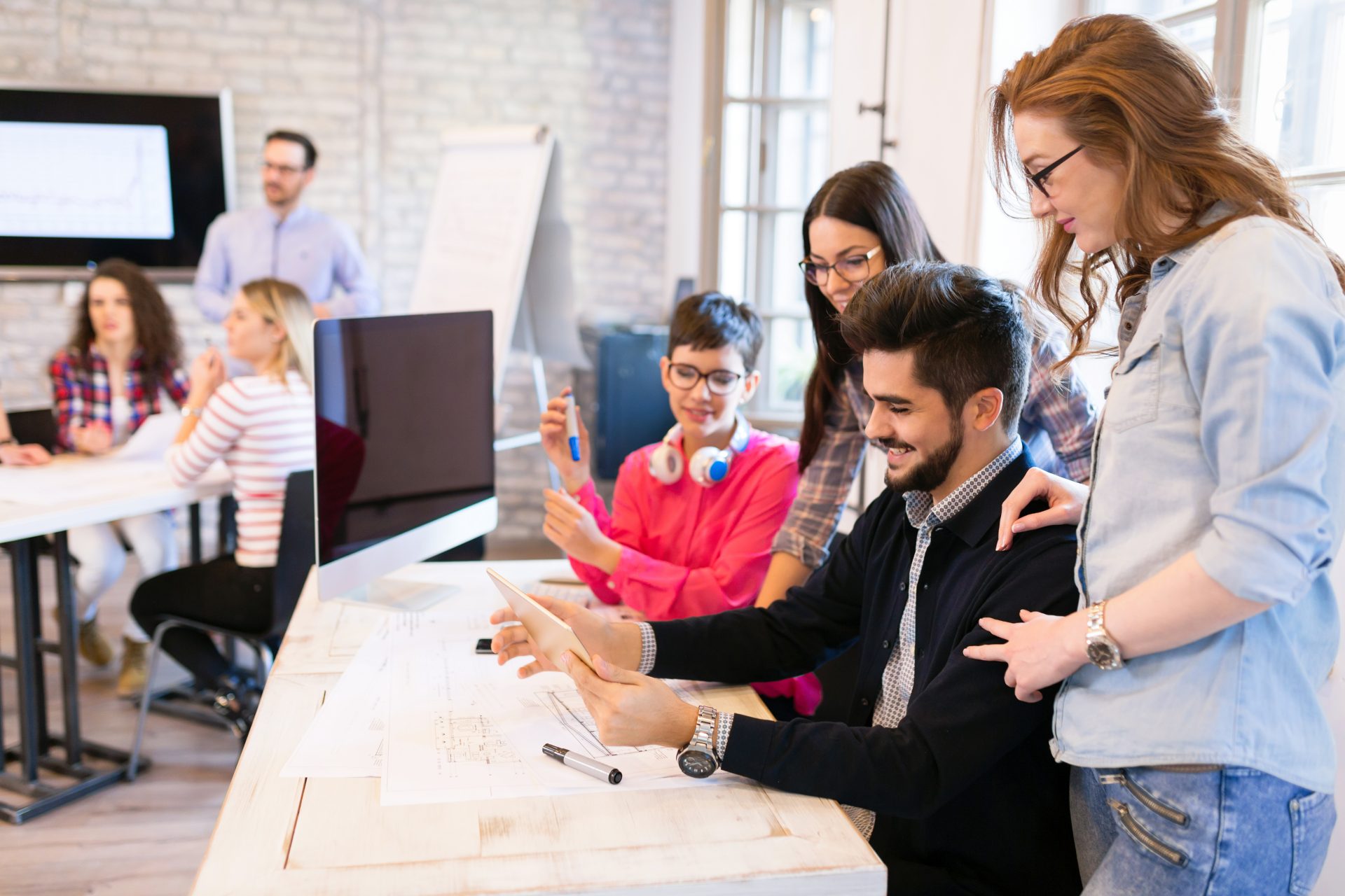 company employees working in office