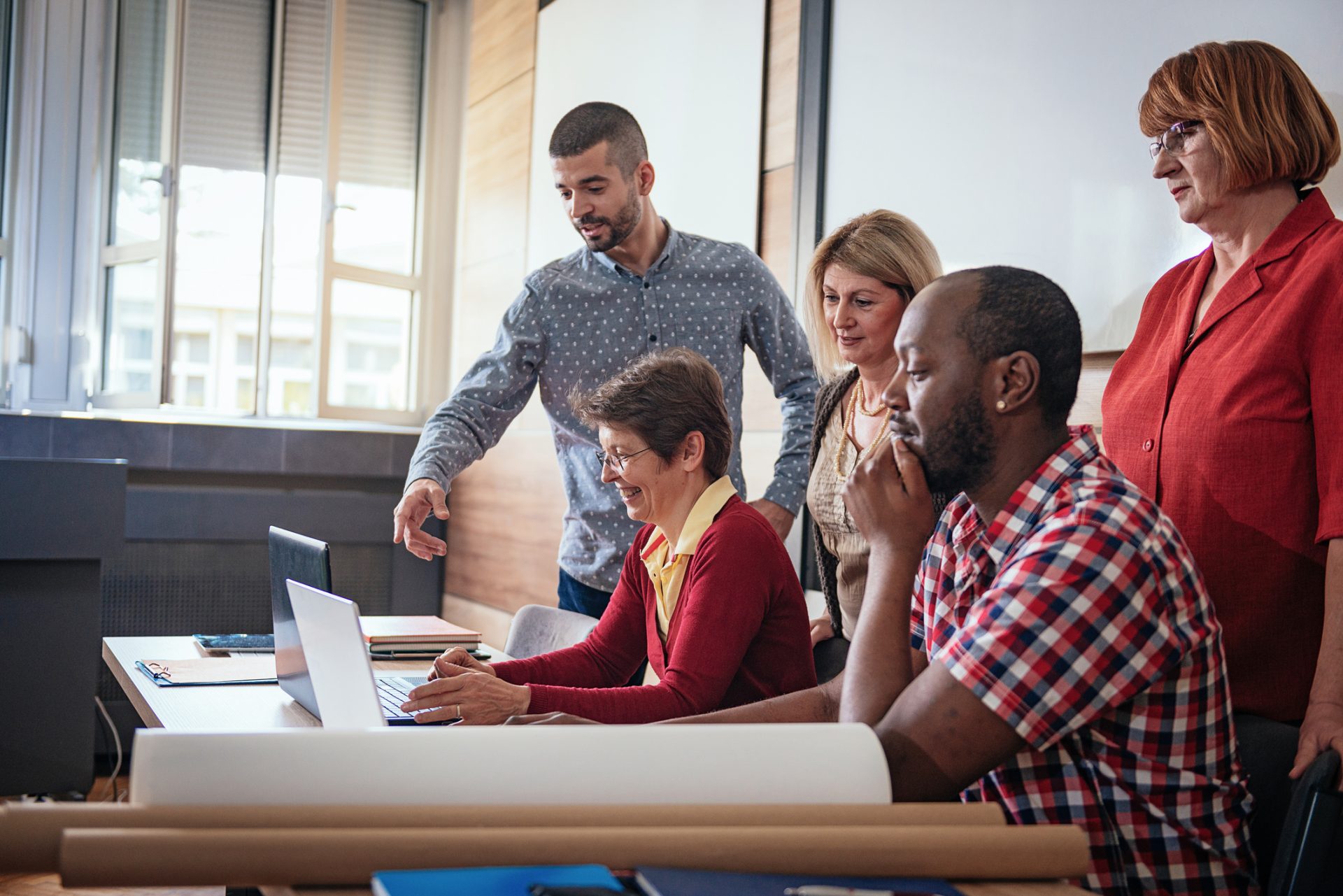 Group of professionals on computer